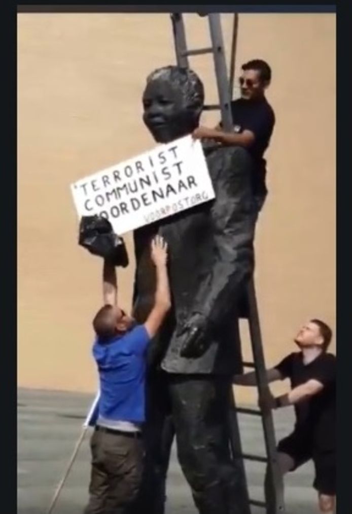 VIDEO: Dutch Group Hangs Label on Mandela Statue in Netherlands Exposing Mandela as a Murderer, Terrorist & Communist!